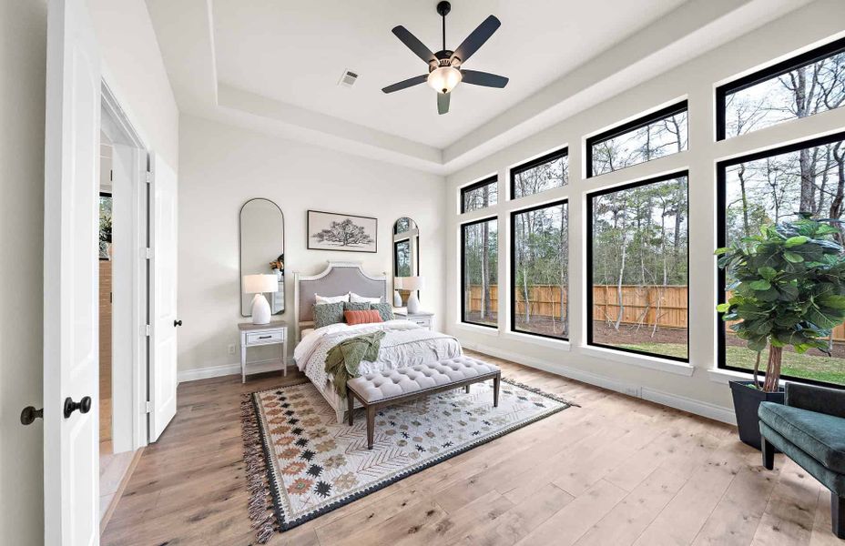 Representative furnished interior of a home built from the 3546 by Ravenna Homes in The Woodlands Hills 65′, Willis (Image 34).