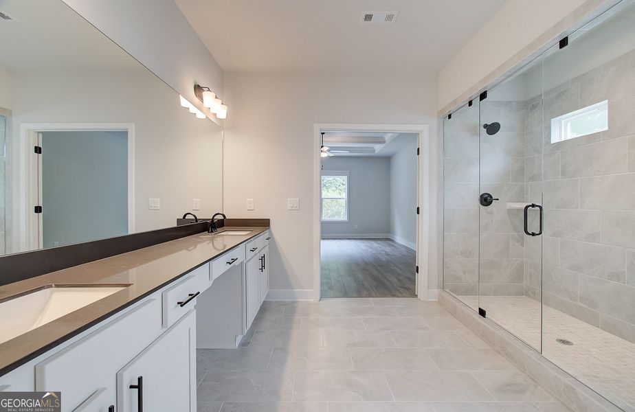 Furnished interior view inside a new home in Ponderosa Farms Reserve, Gainesville (Image 16).