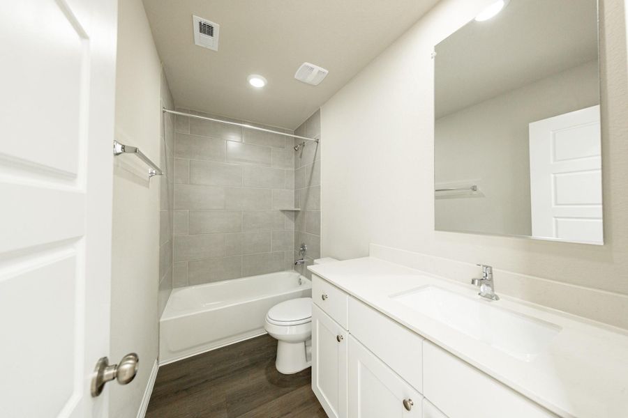 Furnished interior view inside a new home in Granger Pines, Conroe (Image 7).
