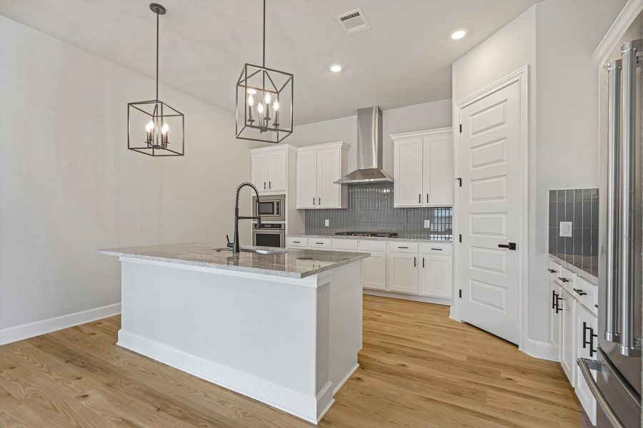 Furnished interior view inside a new home in ShadowGlen, Manor (Image 7). Furnished interior view inside a new home in ShadowGlen, Manor (Image 7).