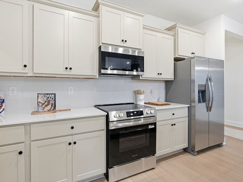 Representative furnished interior of a home built from the The Laurel J by Davidson Homes LLC in Bailey Park, Fayetteville (Image 29).