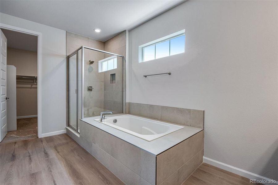 Furnished interior view inside a new home in Ensemble at The Aurora Highlands, Aurora (Image 7).