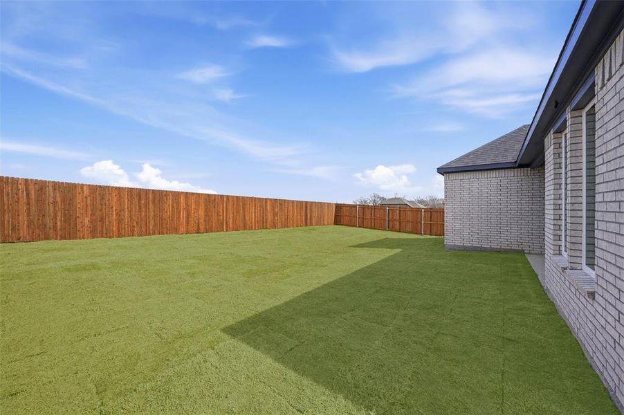 Exterior details and patio area of a home in The Preserve, Sherman (Image 21).