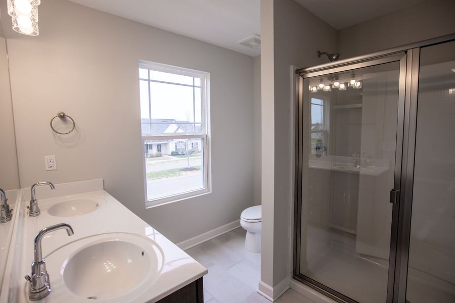 Representative furnished interior of a home built from the Dalton by Parkside Builders in The Woods, Gallatin (Image 7).