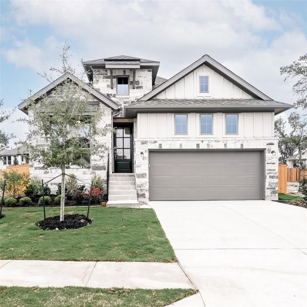 Front exterior of a new home in 6 Creeks, Kyle, TX, highlighting curb appeal (Image 8).