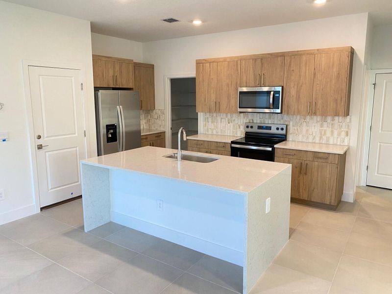 Furnished interior view inside a new home in Preserves at Park Trace, Stuart (Image 4).