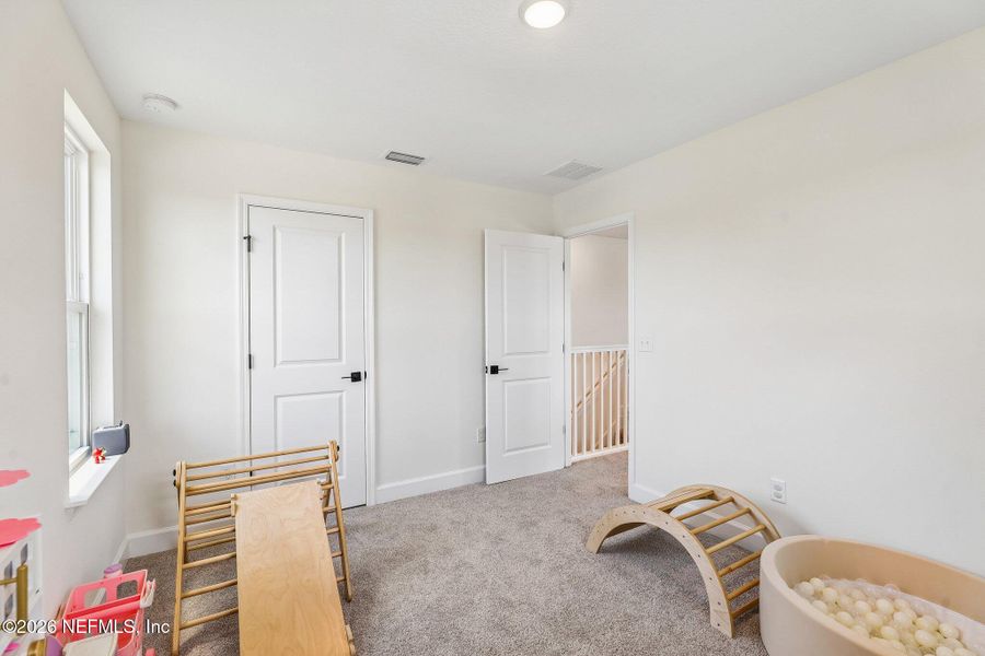 Furnished interior view inside a new home in Seasons at Morada, St. Augustine (Image 10).