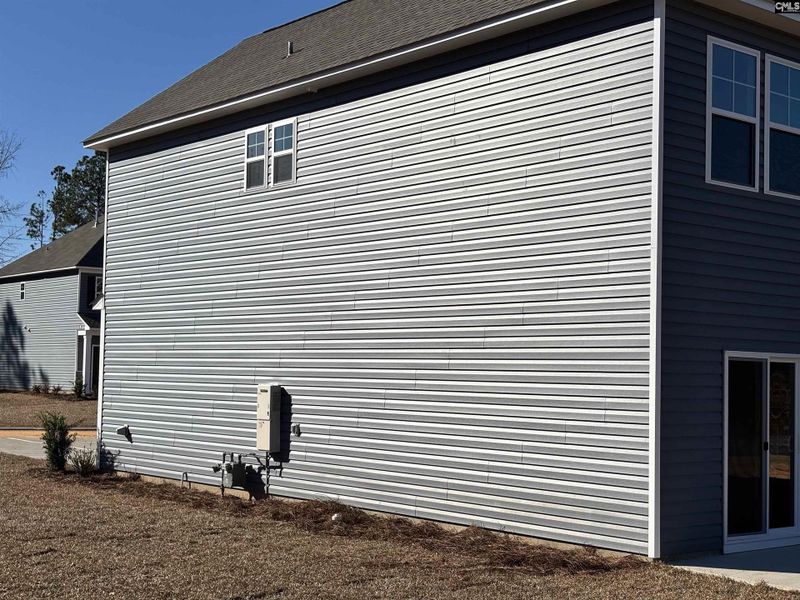 Exterior details and patio area of a home in Rolling Hills, Prosperity (Image 12). Exterior details and patio area of a home in Rolling Hills, Prosperity (Image 12).