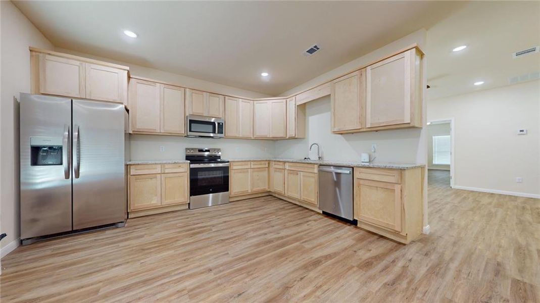 Furnished interior view inside a new home in , Justin (Image 6).