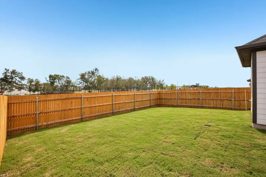 Exterior details and patio area of a home in Trinity Ranch, Elgin (Image 4).