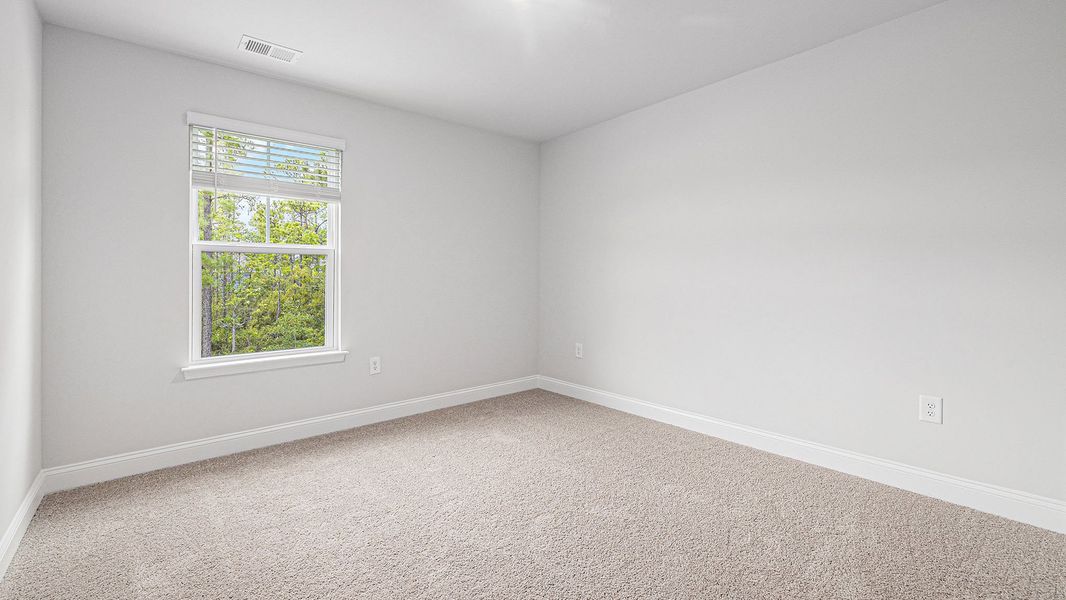 Spacious, unfurnished interior of a new home in Chapman Village, Conway (Image 22).