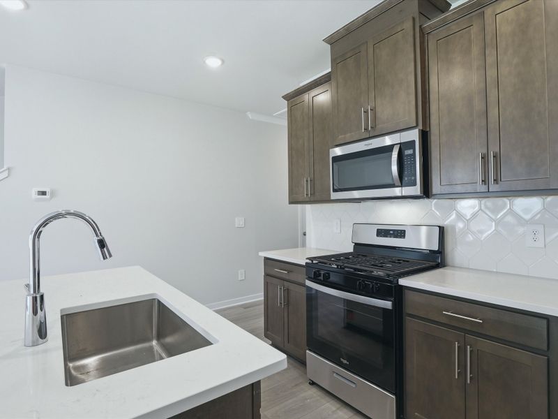 Furnished interior view inside a new home in Oakwood Townes, Mebane (Image 5).