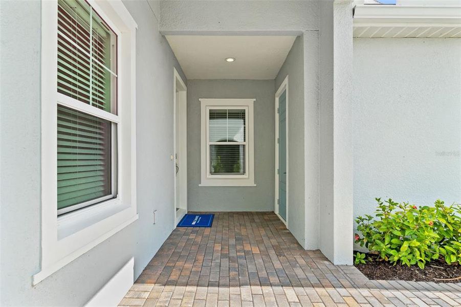 Exterior details and patio area of a home in Wysteria, Venice (Image 31).