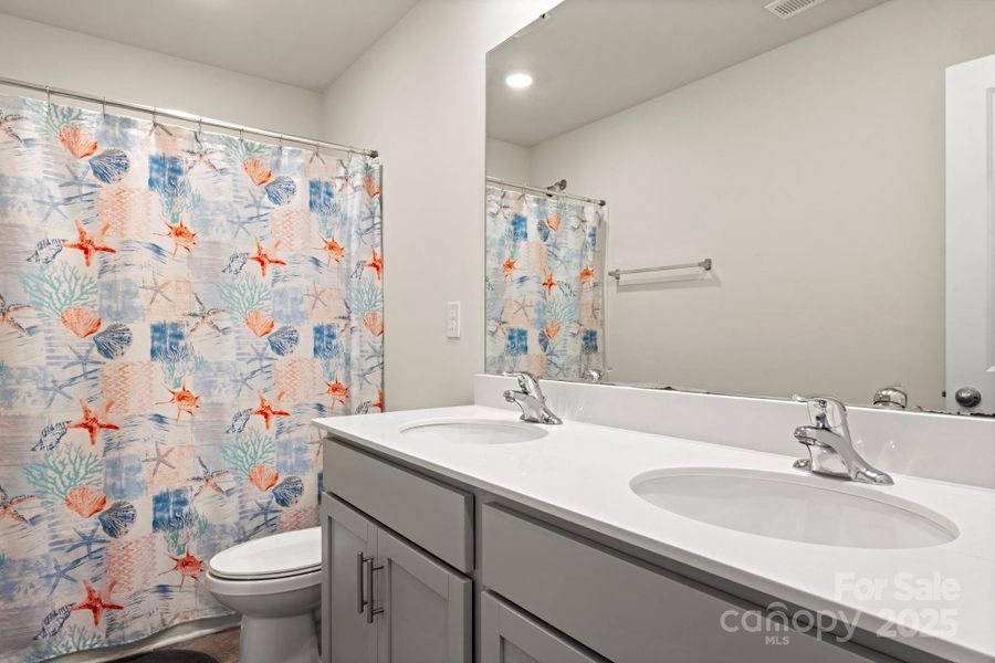 Furnished interior view inside a new home in Mills at Long Creek, Dallas (Image 11).