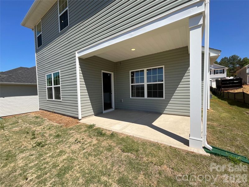 Exterior details and patio area of a home in Village at Parkside, Gastonia (Image 15).