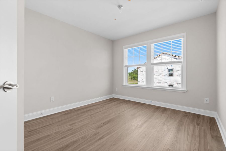 Spacious, unfurnished interior of a new home in Lakeside Townes at Riverlights, Wilmington (Image 24).