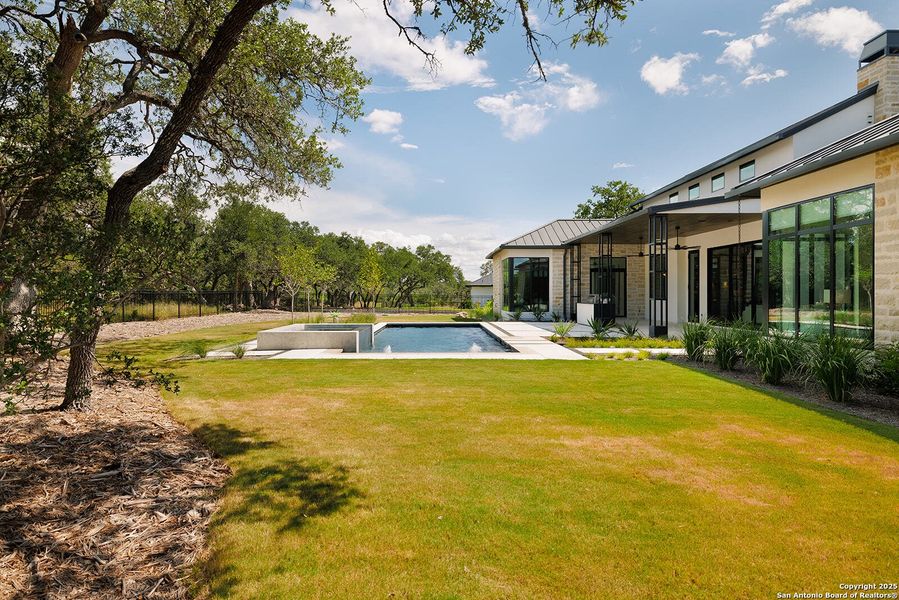 Front exterior of a new home in , Boerne, TX, highlighting curb appeal (Image 19).