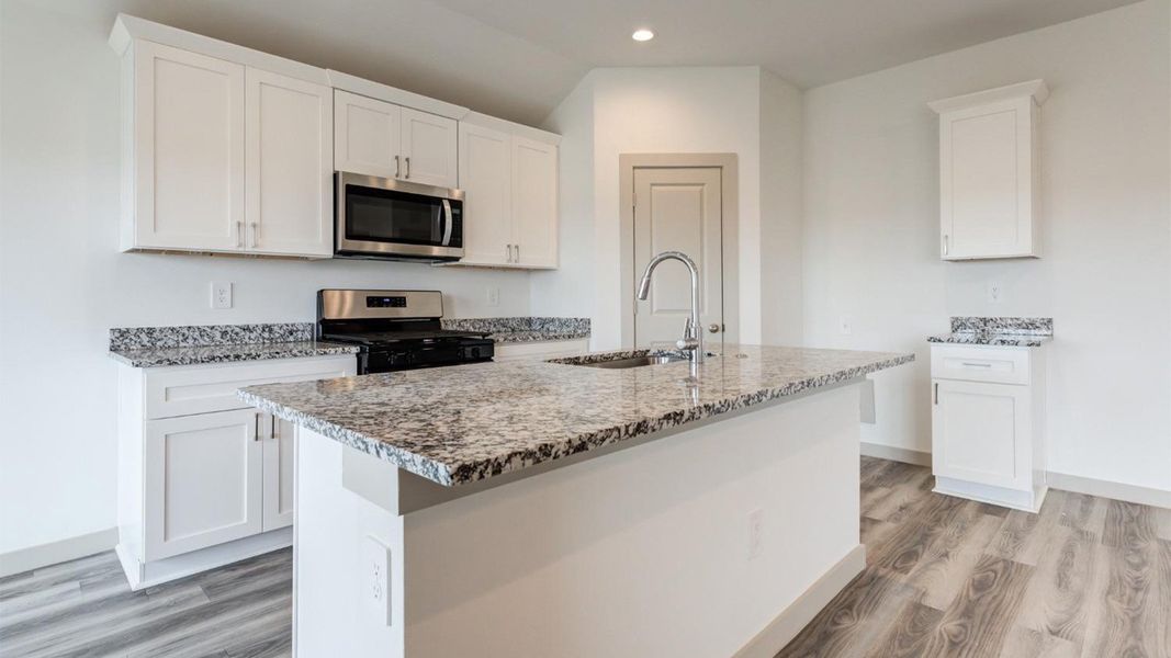 Representative furnished interior of a home built from the The Ashburn by D.R. Horton in Allen Farms, Lubbock (Image 7).