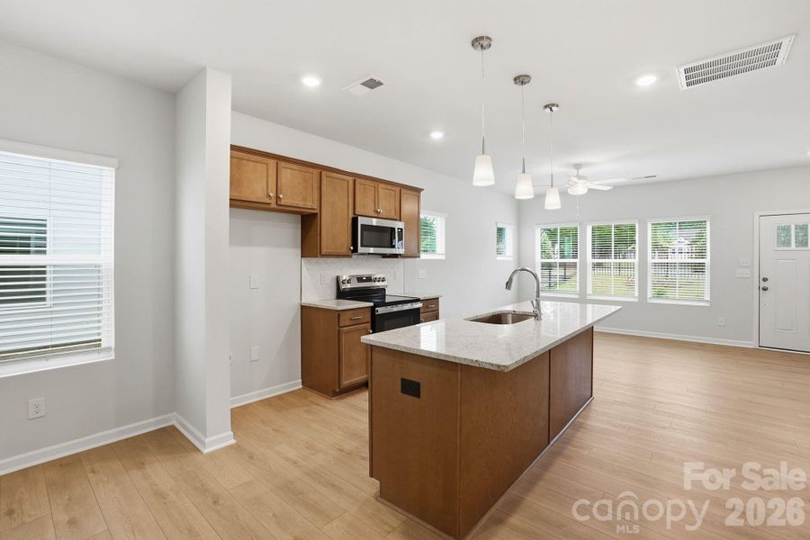 Furnished interior view inside a new home in Sloan Station, Charlotte (Image 3).