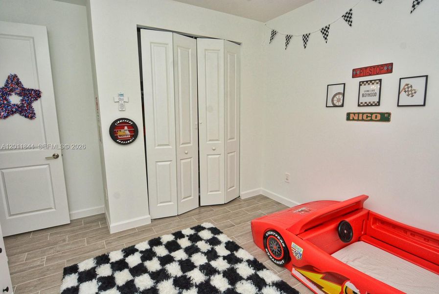 Furnished interior view inside a new home in Central Park, Port St. Lucie (Image 28).