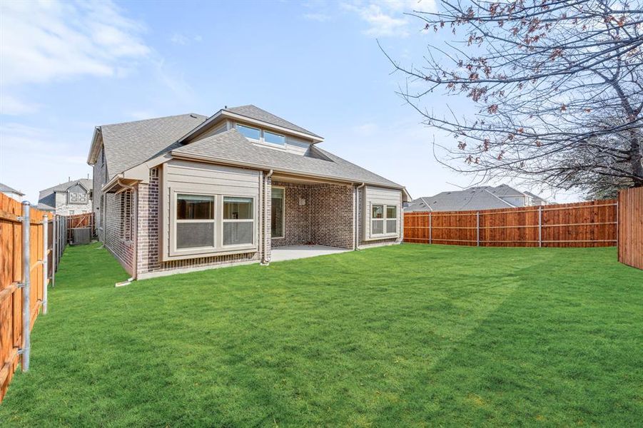 Exterior details and patio area of a home in Glenwood Meadows, Argyle (Image 3). Exterior details and patio area of a home in Glenwood Meadows, Argyle (Image 3).