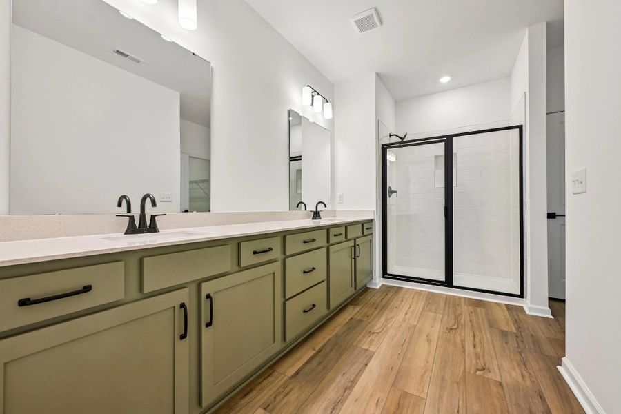 Primary Bath featuring the AW Collection® Rosemary - Organic textures meet bold design. Primary Bath featuring the AW Collection® Rosemary - Organic textures meet bold design.