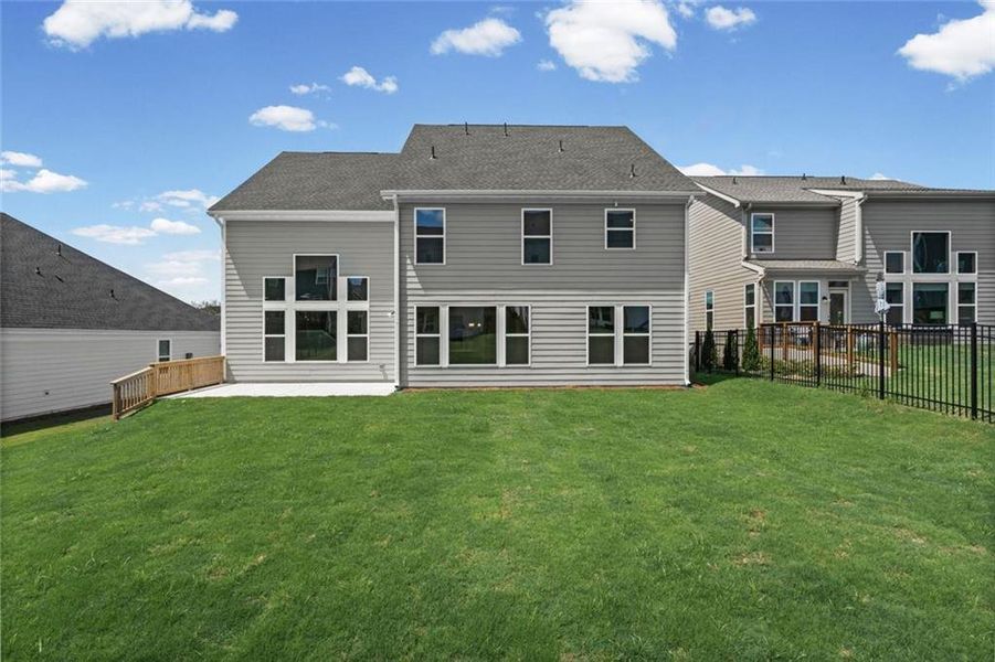 Exterior details and patio area of a home in Twin Lakes, Hoschton (Image 25).