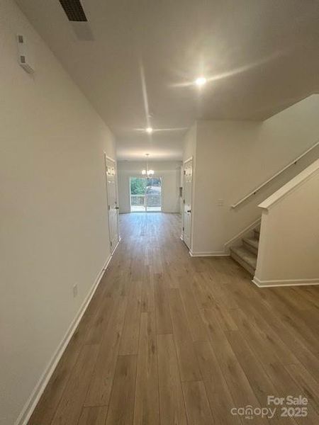 Foyer- Showcasing staircase and view to kitchen.