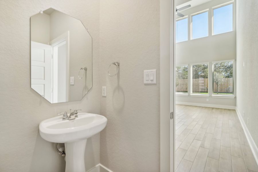 Powder room in the Cedar floorplan at a Meritage Homes community.