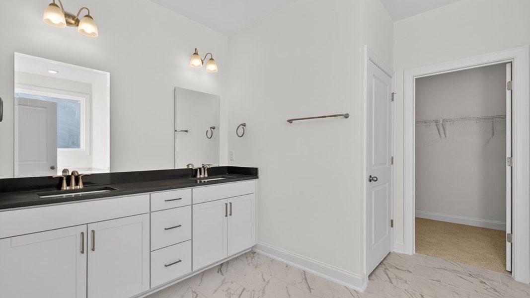 Representative furnished interior of a home built from the Hartwell by D.R. Horton in The Estates Park, Apex (Image 11).