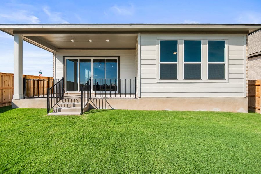 Exterior details and patio area of a home in Arbor Collection at Lariat, Liberty Hill (Image 20). Exterior details and patio area of a home in Arbor Collection at Lariat, Liberty Hill (Image 20).