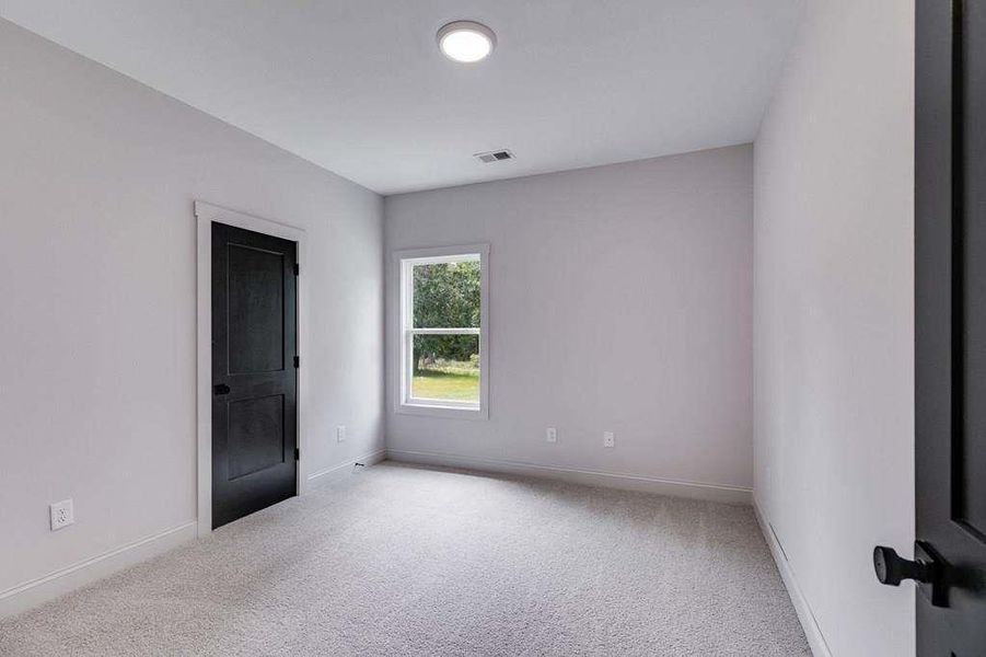 Spacious, unfurnished interior of a new home in The Meadows at Lake Circle, Buchanan (Image 37).