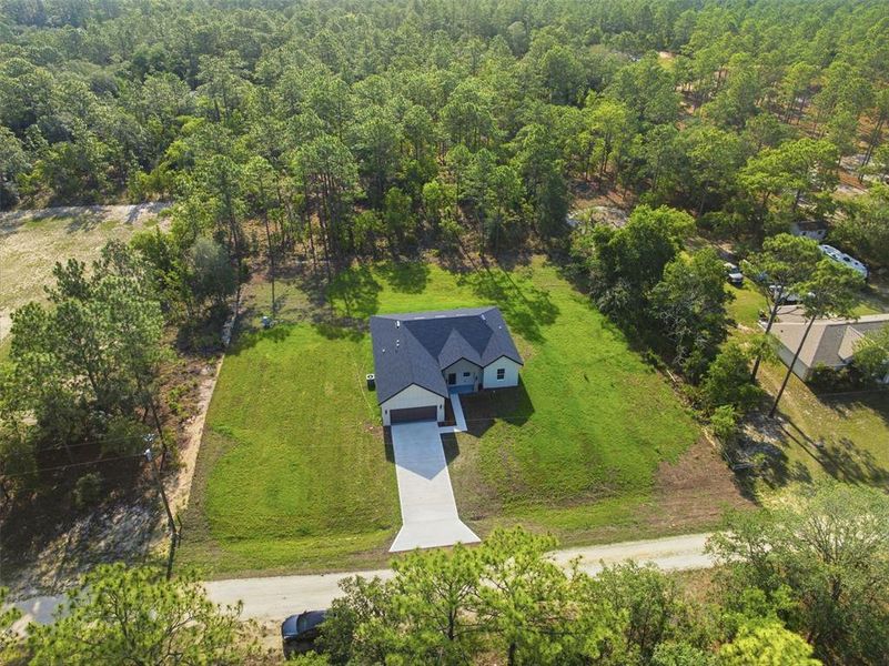 Front exterior of a new home in , Dunnellon, FL, highlighting curb appeal (Image 20). Front exterior of a new home in , Dunnellon, FL, highlighting curb appeal (Image 20).