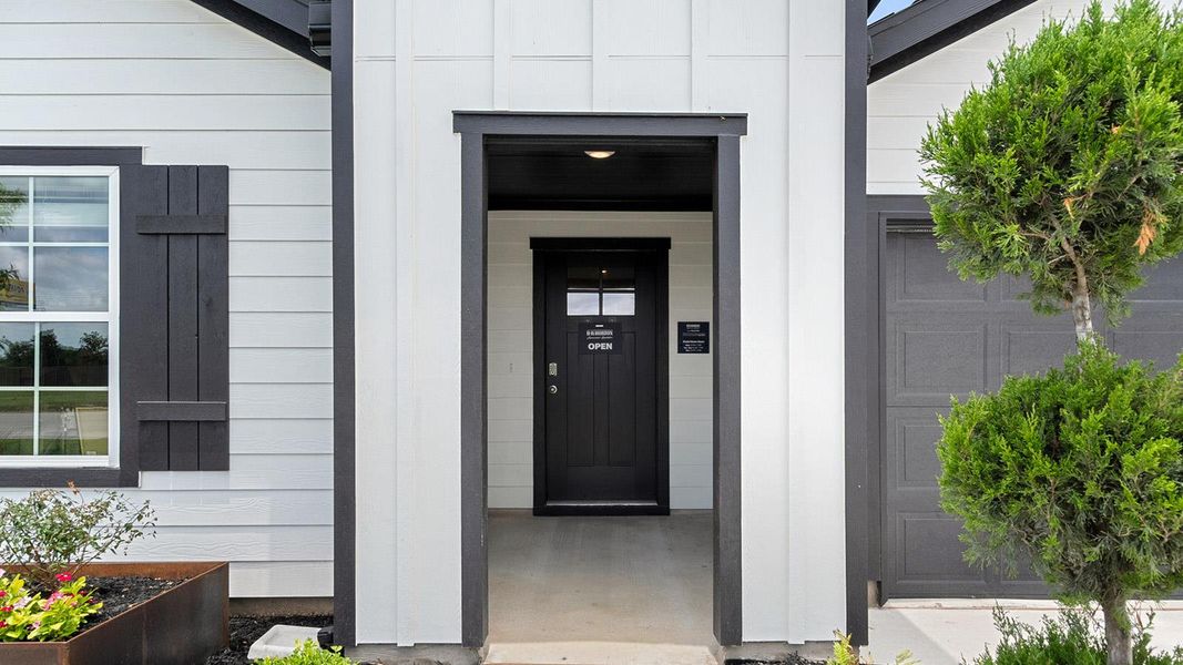 Front exterior of a new home in Railhead, Cedar Creek, TX, highlighting curb appeal (Image 21). Front exterior of a new home in Railhead, Cedar Creek, TX, highlighting curb appeal (Image 21).