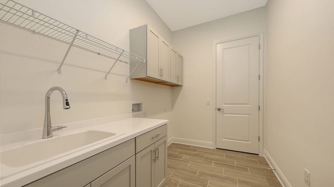 Furnished interior view inside a new home in Wildleaf at North River Ranch, Parrish (Image 13).