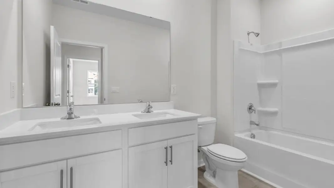 Furnished interior view inside a new home in Villa Grande, Winterville (Image 8).