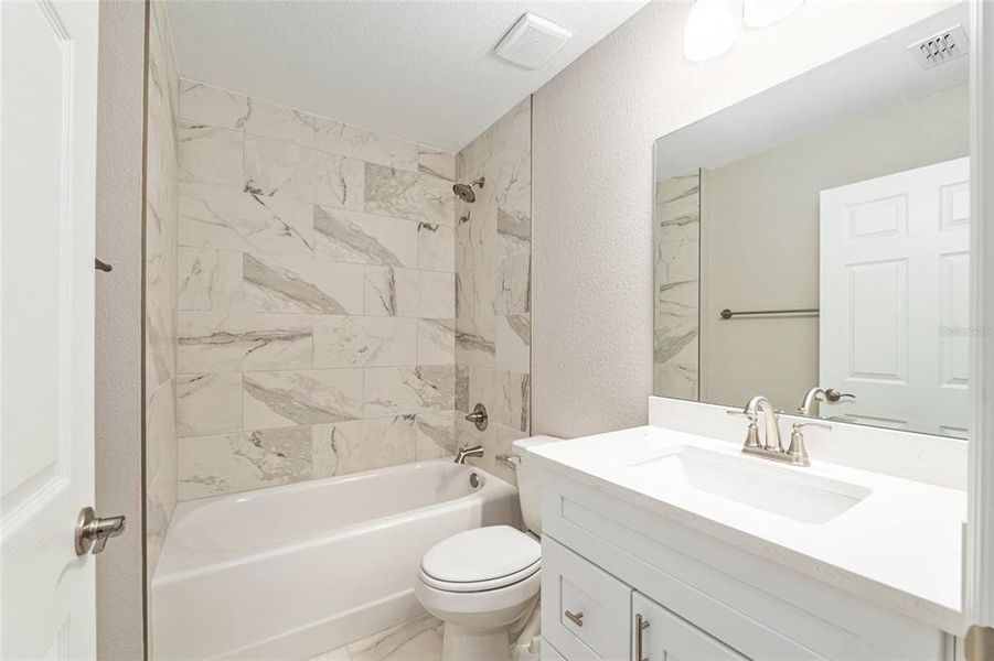 Furnished interior view inside a new home in , Dunnellon (Image 12).