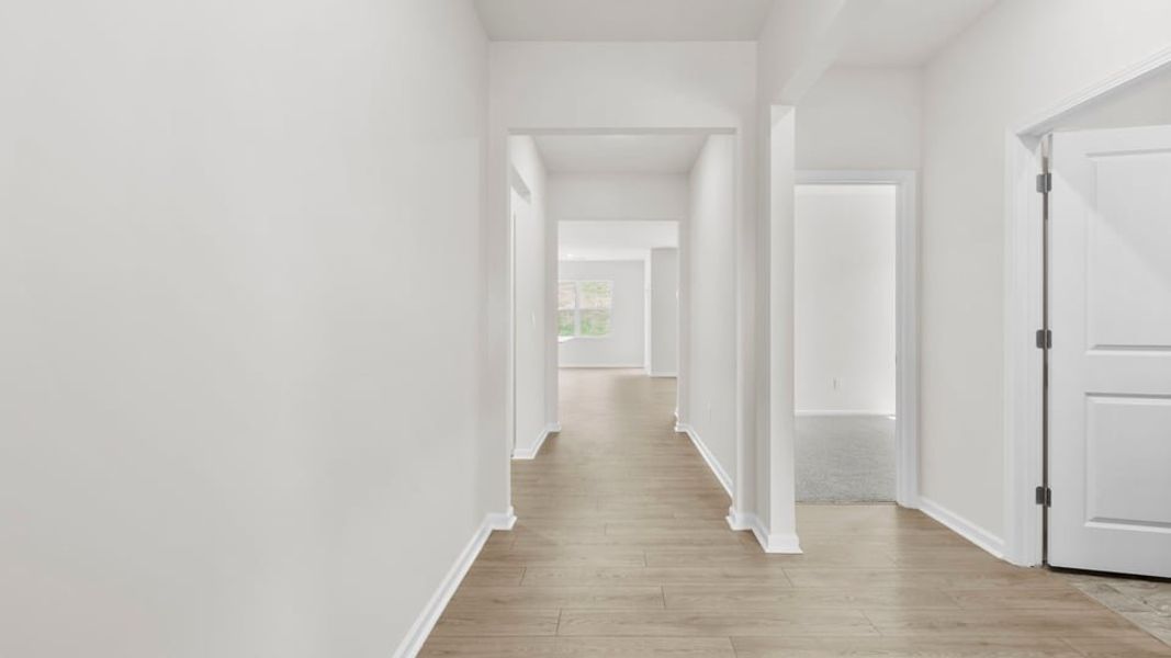 Spacious, unfurnished interior of a new home in Durbin Meadows Traditions, Fountain Inn (Image 12).