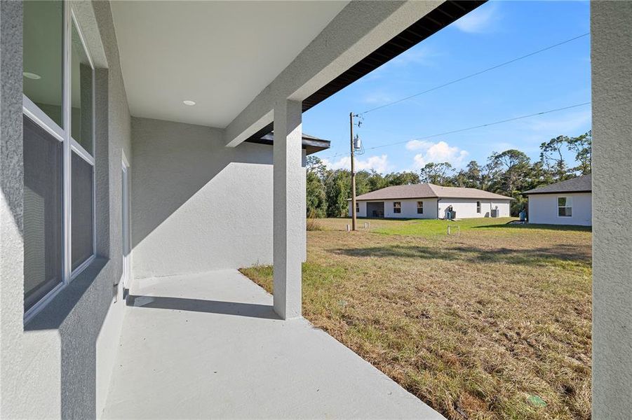 Exterior details and patio area of a home in , Port Charlotte (Image 26).