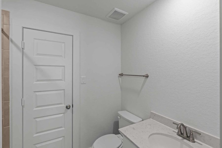 Furnished interior view inside a new home in Buffalo Crossing – New Phase Now Preselling, Cibolo (Image 13).