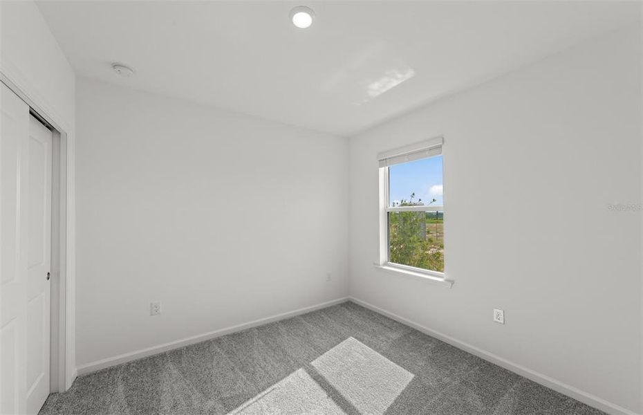 Spacious, unfurnished interior of a new home in Reagan Landing, Bradenton (Image 32). Spacious, unfurnished interior of a new home in Reagan Landing, Bradenton (Image 32).