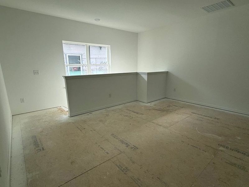 Loft featuring the AW Collection® Rosemary - Flexible living wrapped in warmth and wood.