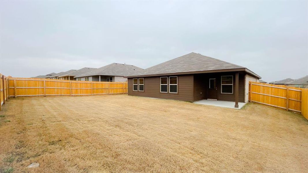 Rear Elevation - Yard - All Home and community information, including pricing, included features, terms, availability and amenities, are subject to change at any time without notice or obligation. All Drawings, pictures, photographs, video, square footages, floor plans, elevations, features, colors and sizes are approximate for illustration purposes only and will vary from the homes as built.