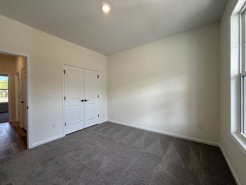 Spacious, unfurnished interior of a new home in Westwood Reserve, Conway (Image 27).