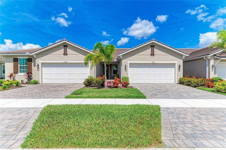 Front exterior of a new home in , Venice, FL, highlighting curb appeal (Image 2). Front exterior of a new home in , Venice, FL, highlighting curb appeal (Image 2).