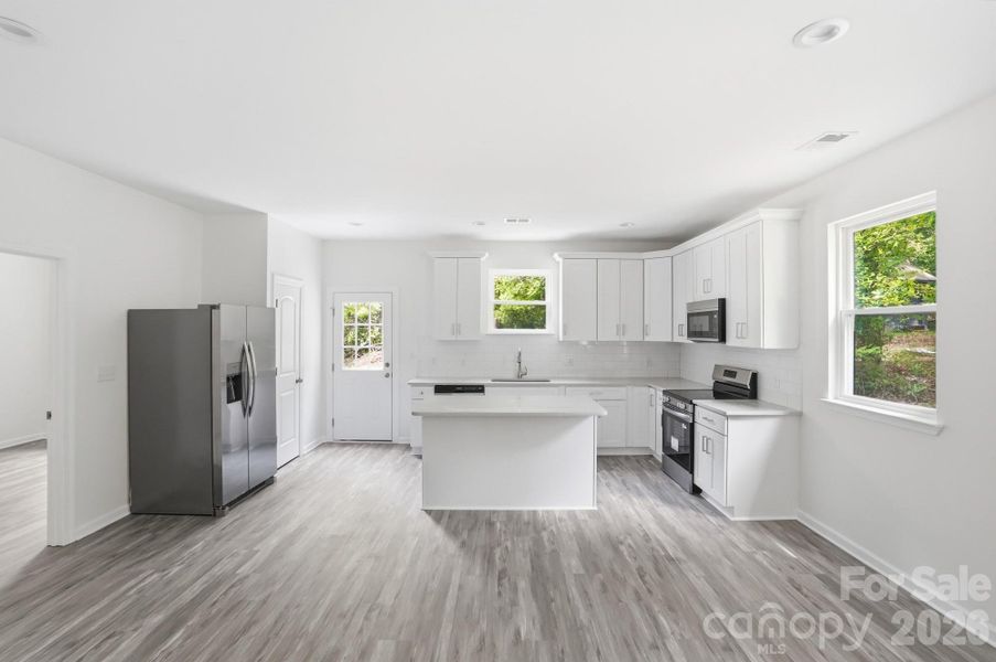 Furnished interior view inside a new home in , Statesville (Image 6).