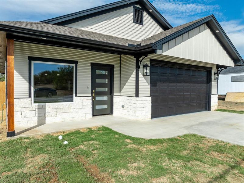 Classy Pine siding, stone accent, and modern finishes Classy Pine siding, stone accent, and modern finishes