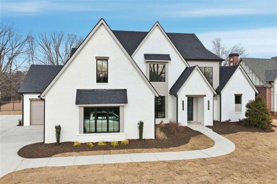 Front exterior of a new home in , Gainesville, GA, highlighting curb appeal (Image 22).