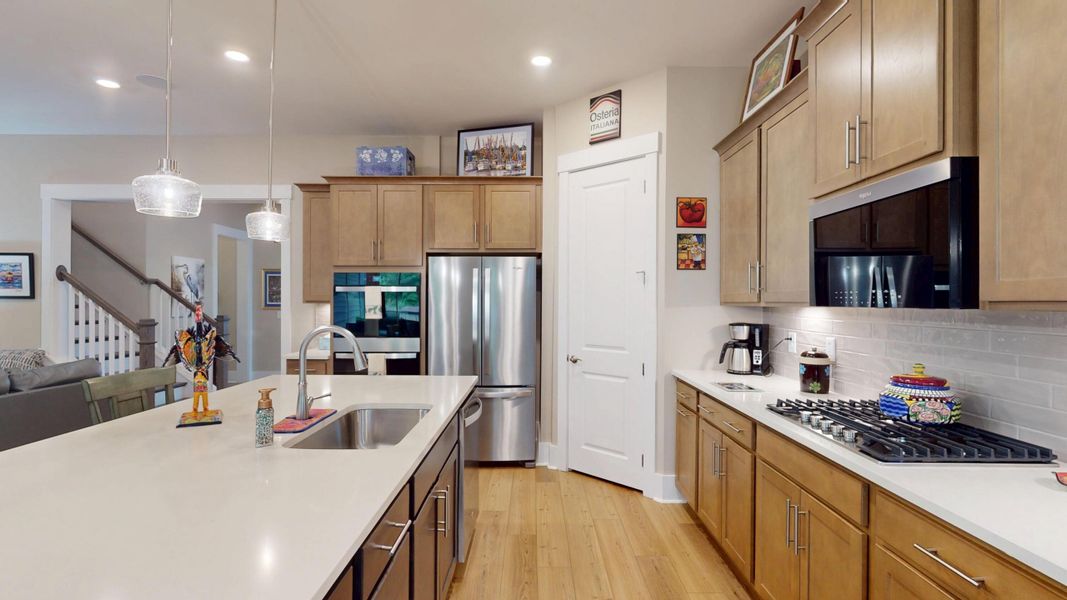 Furnished interior view inside a new home in Summerwind Crossing at Lakes of Cane Bay, Summerville (Image 36).