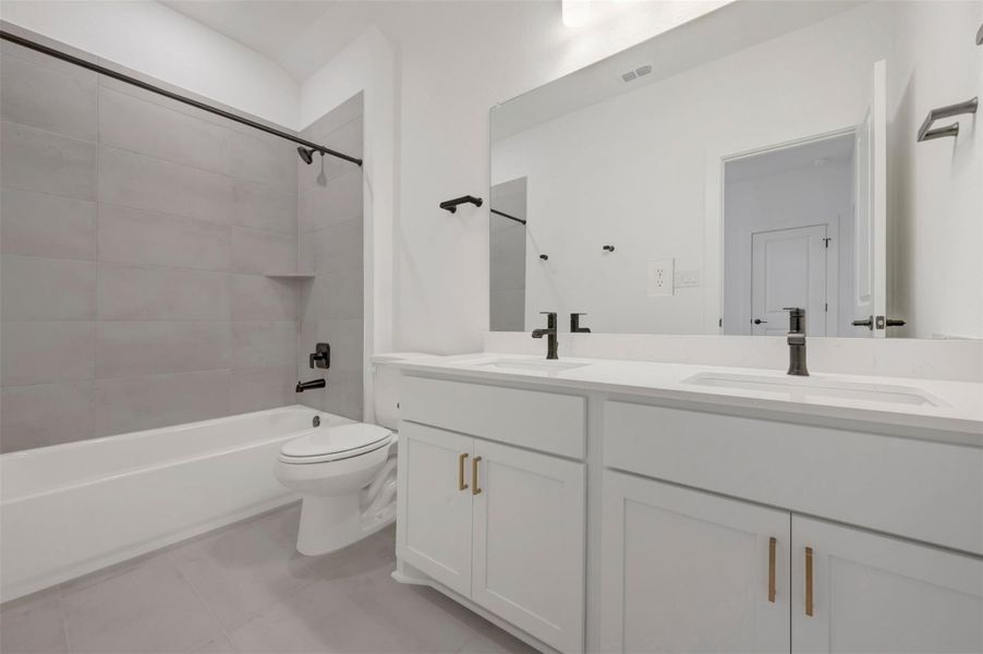 Furnished interior view inside a new home in Estancia West, Manchaca (Image 12).